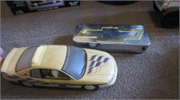 PLASTIC CAR AND METAL CHEVY TIN