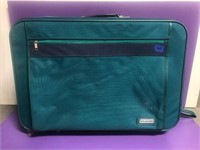 Jewel tone green samsonite suitcase
