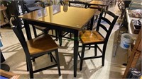 Tall bar style table with four matching chairs,