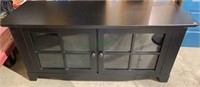 Low storage cabinet with two glass front doors,