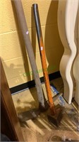 2 handtools, wooden handle pickax and a metal