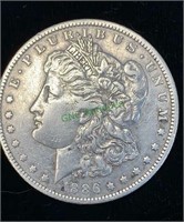 1886 O Morgan US silver dollar coin in a hard