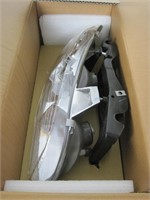 PT Grand Am headlight 96-98 NIB NOS