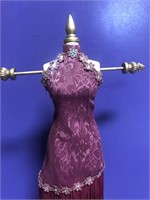 Miniature mannequin style necklace holder