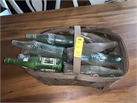 basket of vintage bottles