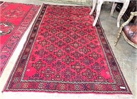Red Area Rug with Fringe Ends