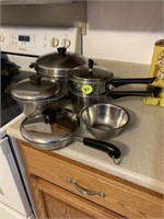 LOT OF STAINLESS POTS AND PANS