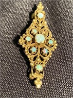 14 karat gold and opal pin missing one small
