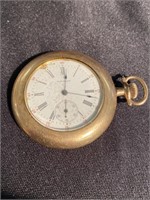 Waltham gold colored pocket watch