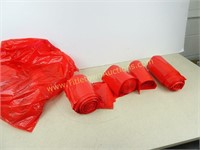 Four Rolls of Red Garbage Bags Stamped Biohazard