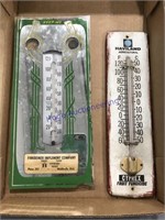 Pair of advertising thermometers
