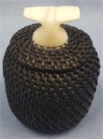 Lidded baleen basket by Carl Hanks with whale tail