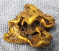Alaska gold nugget weighing 7.4 grams            (