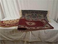 3 Oriental style rugs.
