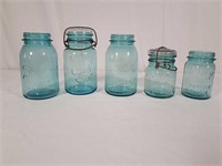 4 blue ball jars and 1 Quick Seal jar.