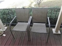 A pair of patio chairs.