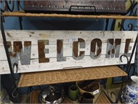 SHABBED WELCOME SIGN