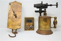 Brass scale, torch, and postal lock box door