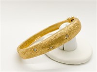 14k gold hinged bangle with small diamonds