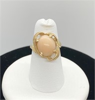 14k womens ring with pink coral? stone