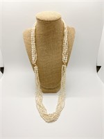 Pearl necklace with gold beads
