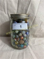 jar full of antique marbles