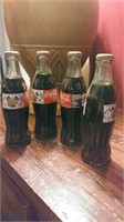 4 8oz unopened bottles of Coca Cola from 1997