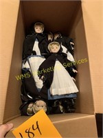 Box of Face Amish Dolls