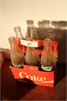 6 COKE BOTTLES & CARDBOARD CASE 16OZ