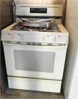 Lot #592 - Gas range and utensils