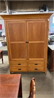 Entertainment cabinet with doors