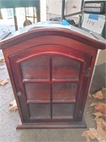 Cherry finish table top curio cabinet