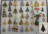 Collection of rhinestone Christmas tree brooches