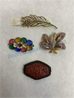 Grouping of vintage signed costume brooches