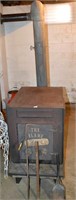 The Flame Cast Iron Wood Stove - does come with