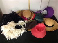 Assortment of boa's and straw hats
