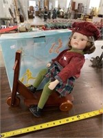 Porcelain Doll With Scooter