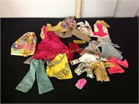 Assortment of vintage Barbie clothes (some rough