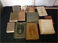 Assortment of vintage war books including With