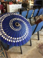 Parasol with tube container