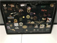 Display Case of Souvenir Pins & More