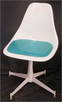 Turquoise seat molded chair - propeller base