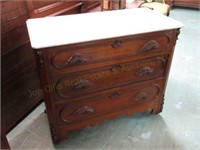 Victorian Marble Top Chest with Carved Pulls. 33