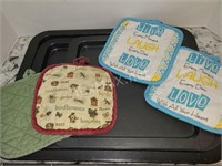 3 Pans and 4 Potholders