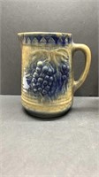 Early stoneware pitcher grape pattern