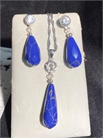 Blue lapis pendant on a silver chain and pierced