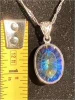 Mystic topaz pendant set in sterling silver on a