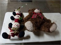 Stuffed bear and snowmen