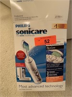 NEW SONICARE TOOTHBRUSH