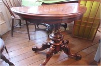 Ornate carved drop leaf occasional table